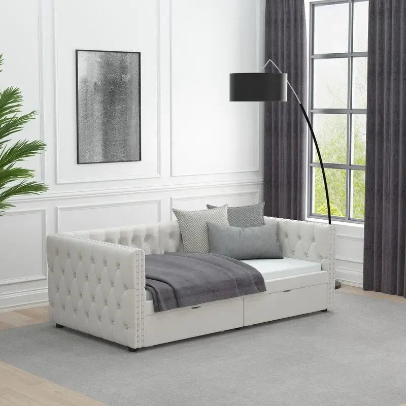 Lit de repos capitonné simple avec tiroirs, boutons et clous cuivrés