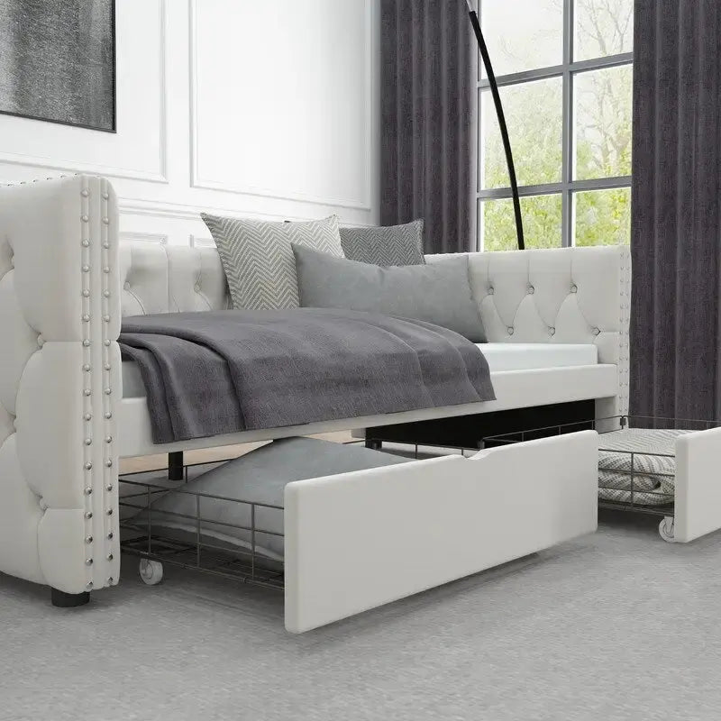 Lit de repos capitonné simple avec tiroirs, boutons et clous cuivrés