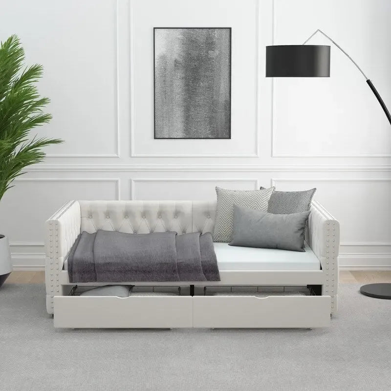 Lit de repos capitonné simple avec tiroirs, boutons et clous cuivrés