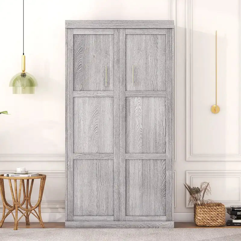 Le lit escamotable en bois peut être replié dans une armoire